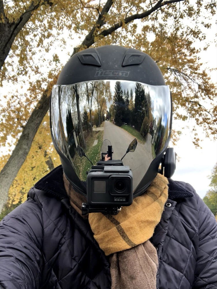 Ogulcan Aydogan riding a motorcycle with a GoPro on his helmet